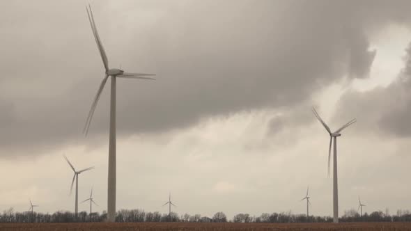 Wind Power Generators Clouds Passing