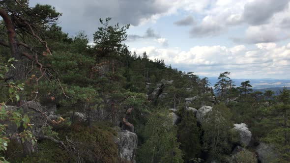 Walk through the rock blocks. Bare rocks high in the mountains. Rock town. Taken in Sto?owe Mountain