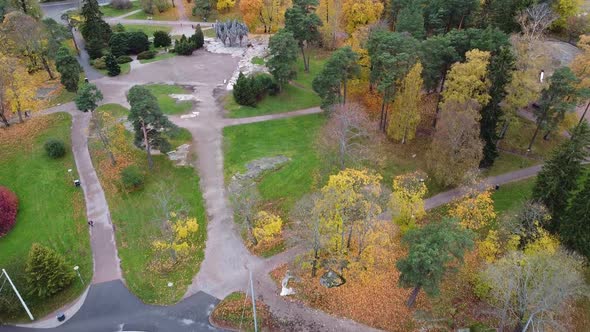Aerial flyover park area with colorful trees in autumn,Helsinki,Finland.
