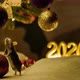 Curious gray mouse touches a large red Christmas ball. - VideoHive Item for Sale
