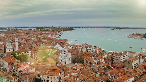 Aerial View of Old Historic City on Banks Wide Water Canal in Venice Slow Motion Medieval Italian