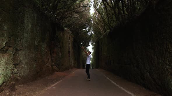 Person is looking and walking around with his hand out at Camino viejo al Pico del Ingles, Tenerife