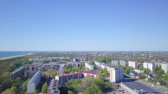 Aerial panorama view of crowded residential district apartment buildings on a sunny summer day, reno