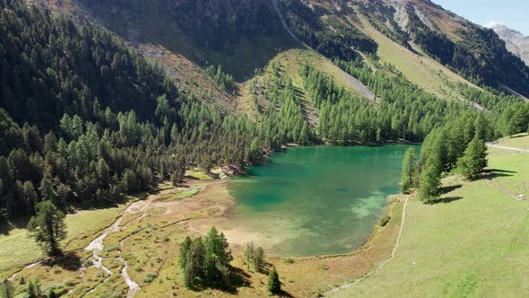 Aerial View Mountain Valley with Alpine Palpuogna Lake in Albulapass Swiss Alps