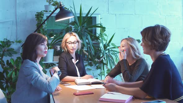 Working Overtime Concept. Group of Female Business Team Working Late at Night