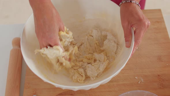 A Thief's Hand Makes Dough in a Plate