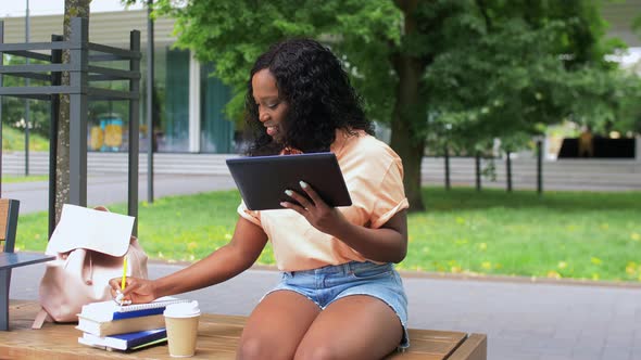 Happy African Student Girl with Tablet Pc in City