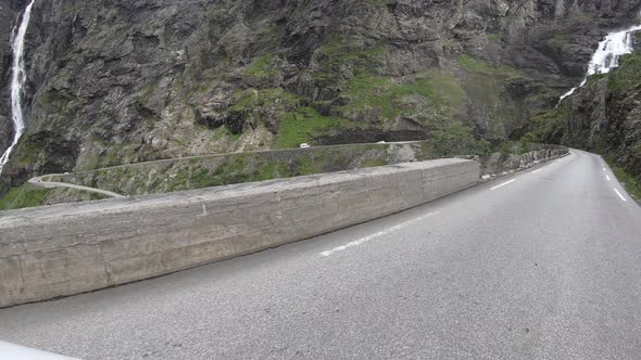 Hyperlapse Of A Car Driving Down On Trollstigen, Serpentine Mountain Pass In Norway. - POV