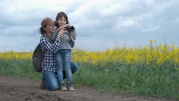 Family with a camera in nature.