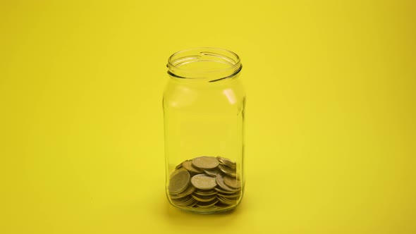 Money Coin in Glass Bottle Growing Money