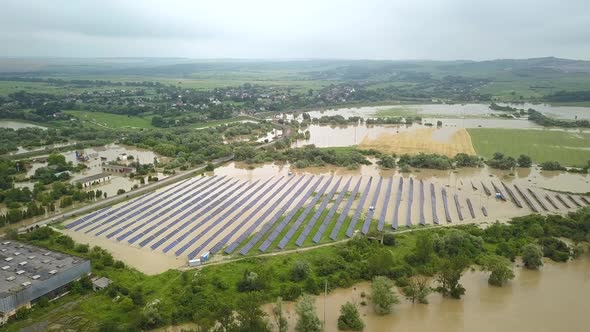 Aerial view of flooded solar power station.