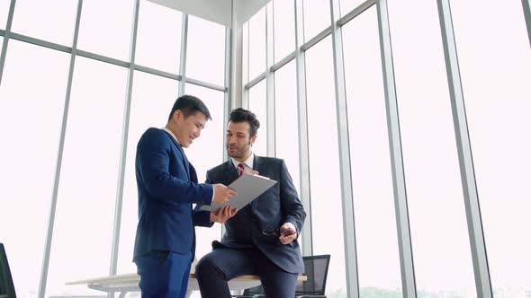 Business People Handshake with Friend at Office