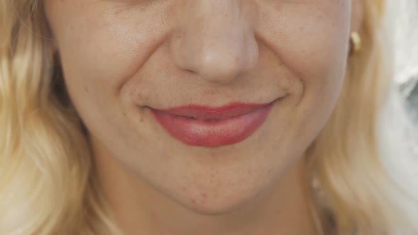 Cropped Shot of a Beautiful Unrecognizable Woman Smiling