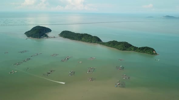 Aerial view boat move at fish farm