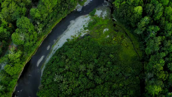 Aerial shot over Piscataquis River at Barrel Falls.