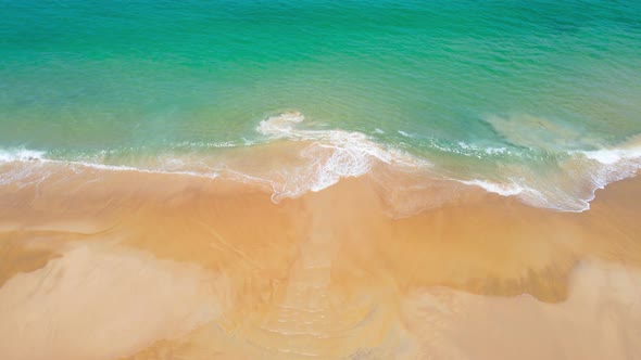 (Top view) Aerial view drone over beach sea. Beautiful sea waves. Beach sand and amazing sea. Summer