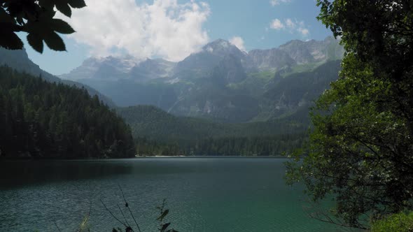 Range of Alps behind Lago di Tovel lake in northern Italy