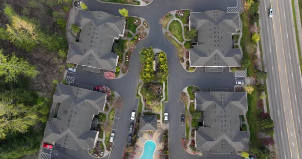 Town down aerial of an apartment complex in America.