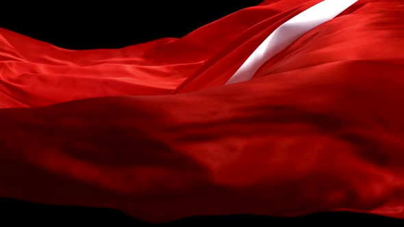 Flowing red velvet curtain with white ribbon, Slow Motion alt