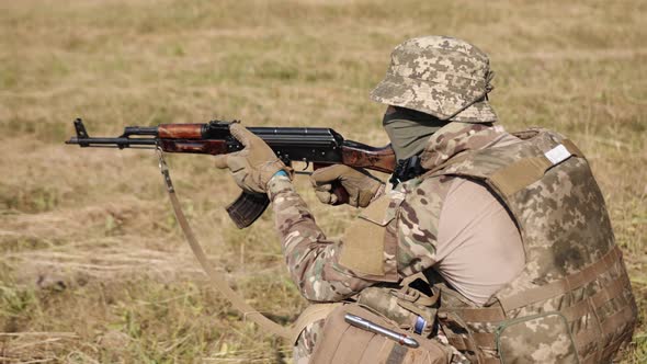 Military Special Forces Unit Attacks the Enemy with Ammunition and Weapons on the Battlefield