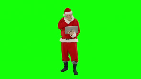 Santa claus using laptop