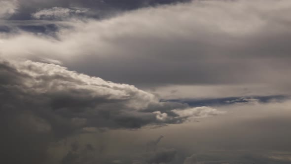 4k Timelapse of typical afternoon cloudscape in tropical south east asia. Dramatic clouds sweep acro