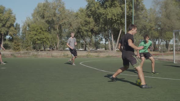 Soccer Ball Hitting Goalpost After Kick During Game