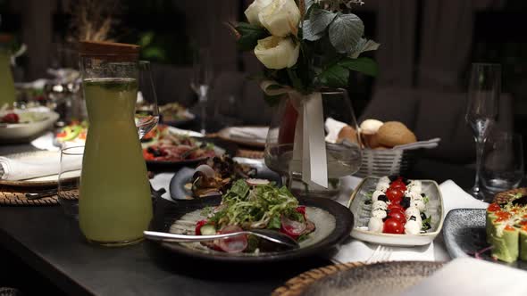 food and drinks on the festive table in the restaurant