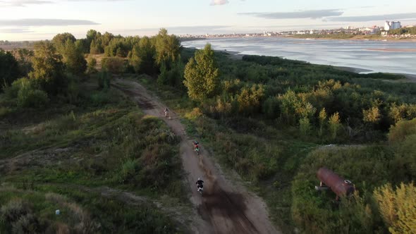 Aerial filming of racing motocross bikes in Tomsk. Siberia, Russia.