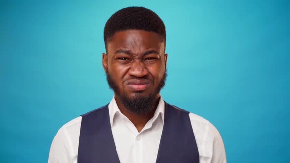Young Bearded African Man Expressing Disgust and Aversion