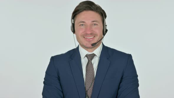 Middle Aged Businessman Smiling at Camera with Headset, White Background