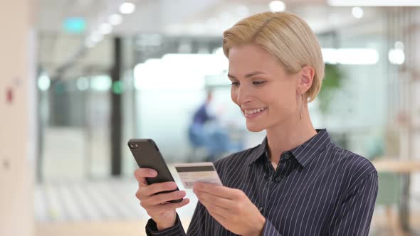 Successful Online Payment on Smartphone By Businesswoman 