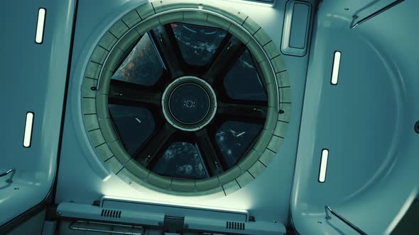 A View of the Earth Through the Big Quadrangle Porthole of a Space Station alt