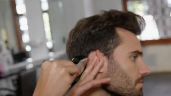 Man getting his hair trimmed