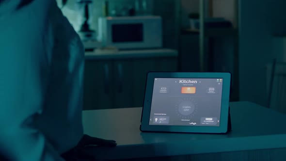 Young Woman Using Smart Home Application with Voice Command