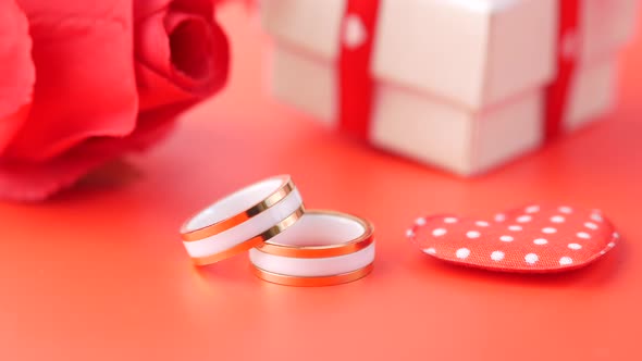 Wedding Ring on a Red Background Close Up
