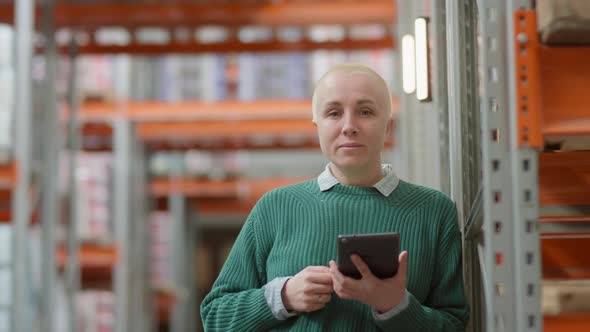 Portrait of Female Warehouse Manager with Digital Tablet