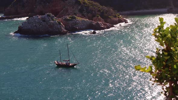 Tourist pirate ship passes treacherous Knysna Heads on a very calm day