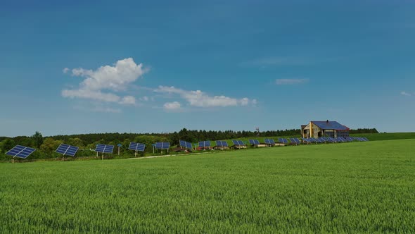 Row of solar panels under blue sky