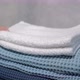 A Young Housewife Woman Touch a Stack of Fresh Washed Clean Linen with Hands - VideoHive Item for Sale