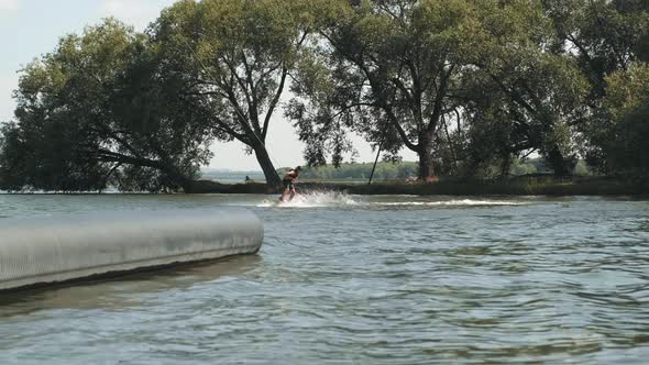Wakeboarding In Lake In Summer