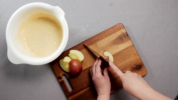 Woman Cuts Apple Slices