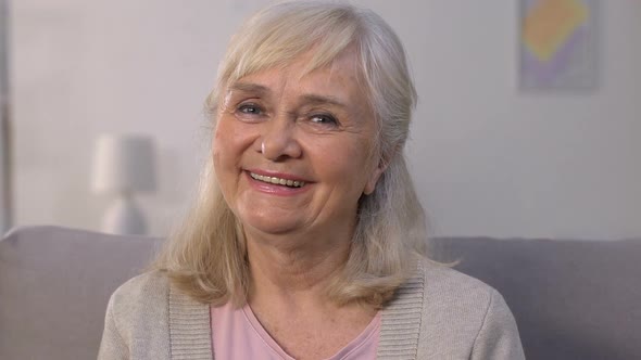 Happy Elderly Female Smiling and Looking at Camera, Health Insurance, Protection