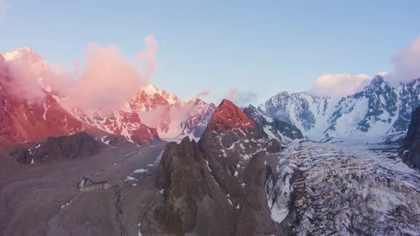Tian Shan Snow-Capped Mountains at Sunset. Aerial Hyper Lapse