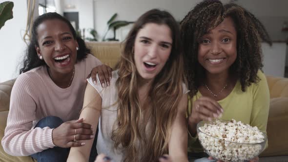 Three Women Having Fun While Playing Online Entertainment Video Games at Home