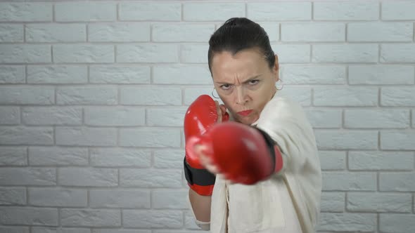 Woman with Boxing Gloves