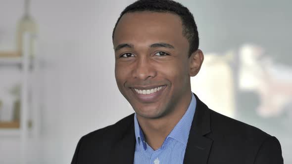 Yes, Positive Casual Afro-American Businessman Accepting Offer By Shaking Head