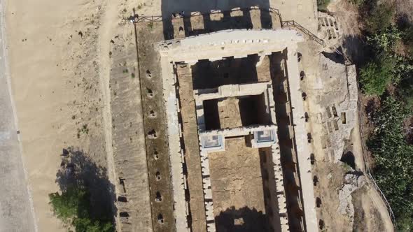 Aerial top down shot of historic greek temple ruin architecture in Agrigento during summer