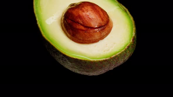 Avocado Half Isolated on Black Background Chroma Key Fresh Sliced Avocado Closeup