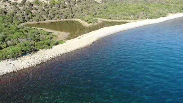 Aerial Flight Over White Sand Beach. Sunny Summer Day. 